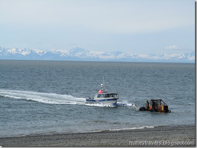 Fishing boat being pulled out of Cook Inlet at Ninilchik, AK