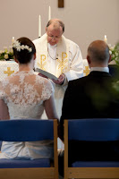 A Couple During Their Wedding Service