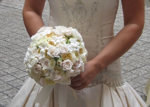 fully hand wired with white majolica and white spray roses  michelle rago