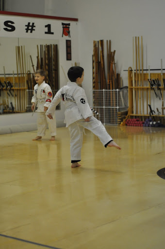 Eli practicing his kicks