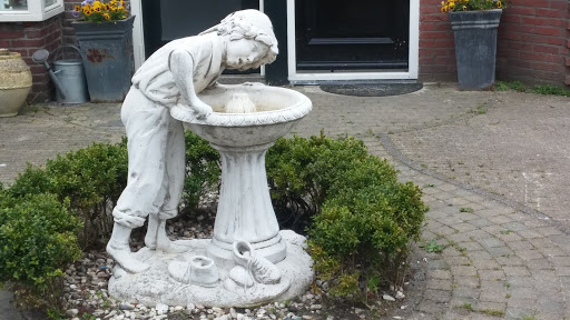Drinking from Fountain
