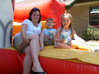 Somer George, Tanner and Alexis Dibbley on the Fun Jump at the parish picnic, May 4, 2008.