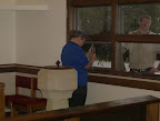 Sally Duhon and Alex Dibbley preparing the east side windows for the stained glass.