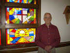Jim Oakley and the "Confirmation" stained glass window.