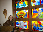 Pam Dibbley and the "Ten Commandments" stained glass window.