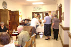 Members of St. Andrew's serving themselves from the buffet.