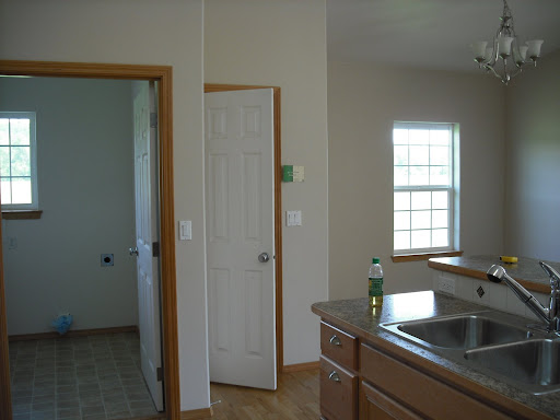 Looking from the Kitchen to the Mud Room, Pantry, and Dining Room (left to right)