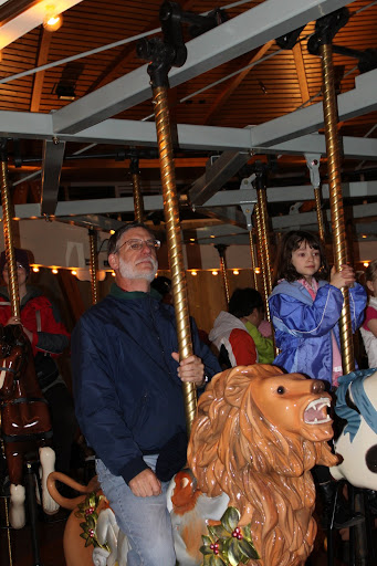 Dean (Jess' uncle) on his lordly lion on the Rose Carousel