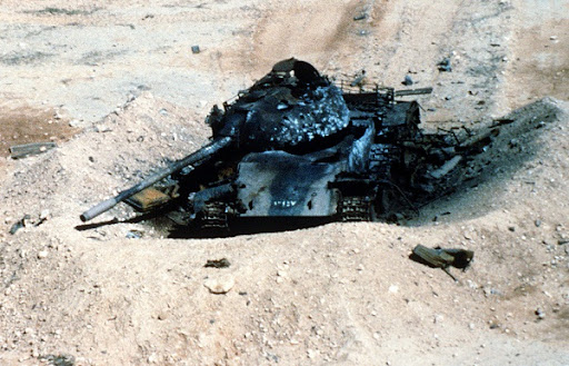 [Image: Iraqi%20tank%20destroyed%20by%20aerial%20bomb.jpg]