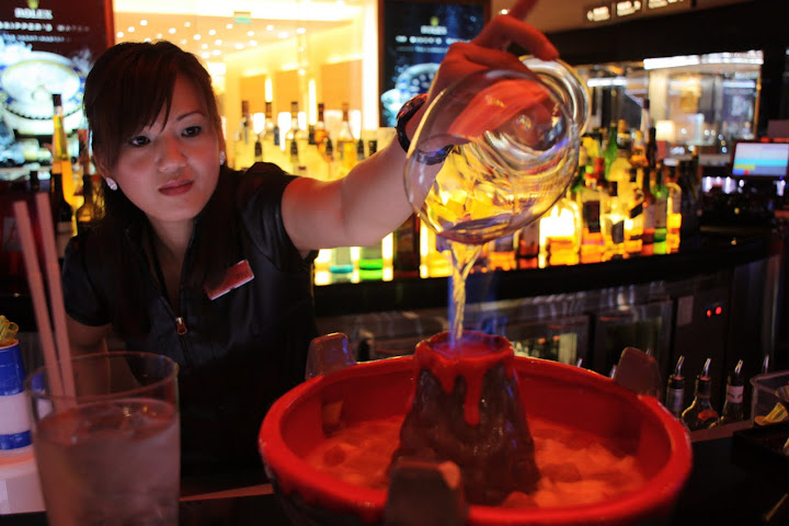Flaming alcoholic drink known as "White Zombie"