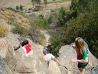 Kendra helping Cindy, Chris and Darion climb down