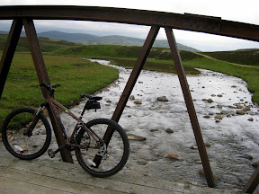 it was still raining so we took a lunch break under this bridge.  we didn't mind the rain so much at this point.  the trail (you can see it on the right), was amazing.