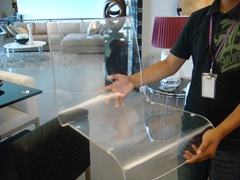 The clear chair uninstalled held by Hazrai