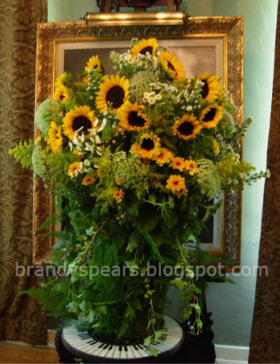  with sunflowers yellow with brown centered mums for a wild flower feel