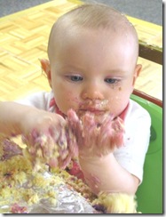 1st birthday party Bella  messy hands and face1