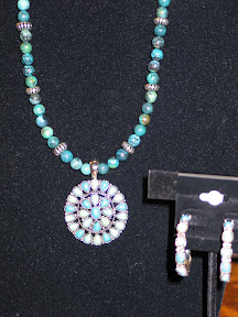 Squash blossom pendant with turquoise inlayed stones