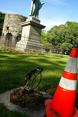 Orange cones like this mark the spot where historic lights had stood until recently