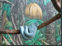 Petrolfärgad python med kul frisyr