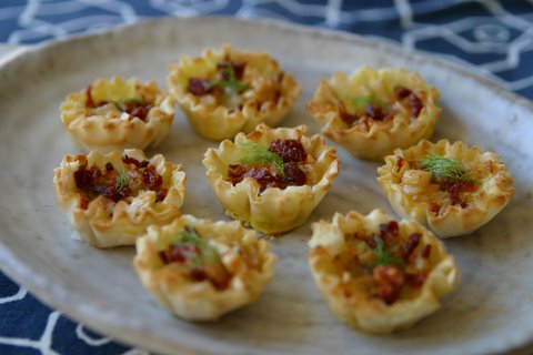 fontine, fennel, & sun-dried tomato tarlets