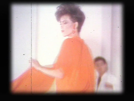 So, they start off the whole vintage theme by showing old reels of fashion runway shows. Thats cheena-piang huge teased hair from the 80s. We dont recommend it, ladies.