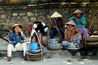 Some locals enjoying lunch on the street.
