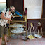 Me carefully examining repurposed Silk Worm cocoons, a strange musty smell around the place.