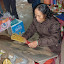 A local demonstration of how to make incense sticks, and then sell them to you.