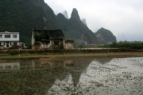 Between Xingping and Yangshuo are many flooded paddy fields creating great reflections of the surrounding mountains.