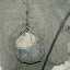 Another hole, another winch, another pile of rocks.