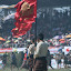 The flag held aloft the victorious party lives to fight again.