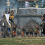 In strides the army and its proud elephant warriors in full battle dress.