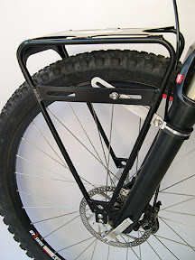 Cold Springs Front (Left) – Load Limit 22kg – $220 The Cold Springs Front is simply the baddest front rack on the market today. Boasting a 50 lb. dynamic load capacity and a wide top shelf, it gets the job done, and then some.