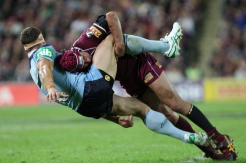 That's Johnathon Thurston showing Luke O'Donnell how to tackle