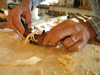 carving a settee seat<br />
note scar at base of pinky...but I can still whip that fiddle