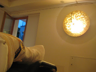 wrapped up like a cocoon basking in the “sun”