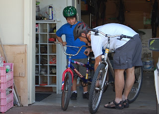 setting Luke up on the $3 garage sale bike