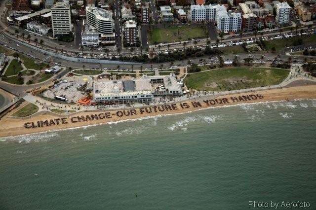 [climate_change_human_sign_stkilda_beach (3)[9].jpg]