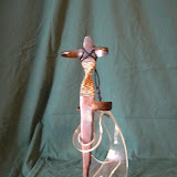Balance, K.M. Newton, 2003  Medium: carbon steel, thread   Dimensions: 5 inches by 12 inches