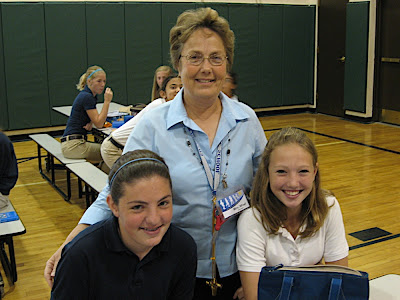 Mrs. Wiwi with students