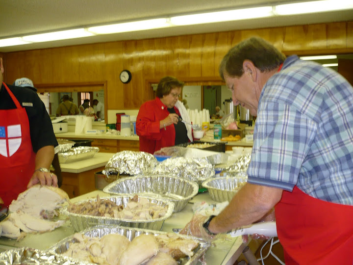 Serving Turkey at the Annual Turkey Dinner at St. Bartholomews