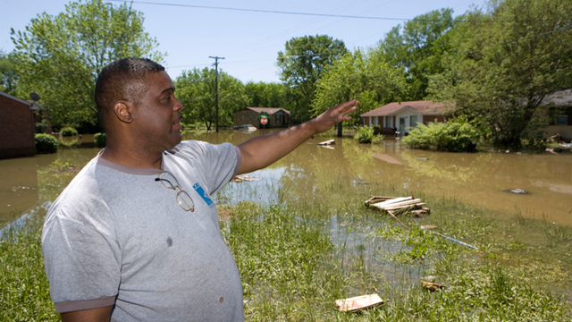 Robert Turner describes the rapid rise of water in his home in the Bordeaux district of Nashville. More than 13 inches of rain fell over two days, leaving many dead and thousands displaced. Rusty Russell / Getty Images