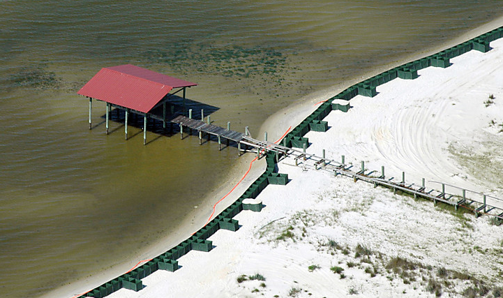 A wall was constructed to protect the northern shore of Dauphin Island, Ala., from the Gulf of Mexico oil spill. Alabama Gov. Bob Riley took a helicopter tour of the state's coast, where barriers are still being placed in the water ahead of the possible spread of the slick toward the state. 10 May 2010, Jay Reeves / AP