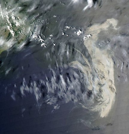 An image from the Moderate Resolution Imaging Spectroradiometer on NASA's Aqua satellite on Tuesday shows significant amounts of oil in the Gulf of Mexico. The difference between the oil-smoothed water and rougher surface of the clean water is enhanced by sunglint. The slick appears as a silvery-gray patch in the center of the image. The tip of the Mississippi Delta is at upper left. NASA / MODIS / Aqua