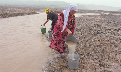 Villagers from Bachamazor, Tajikistan collect river water. Oxfam has warned of dwindling water resources in coming decades. Photograph: Karen Robinson / Oxfam