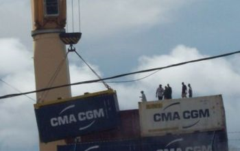 Allegedly containers holding illegally logged rosewood are being loaded on the ship 'Kiara'. Jeremy Hance, Mongabay.com