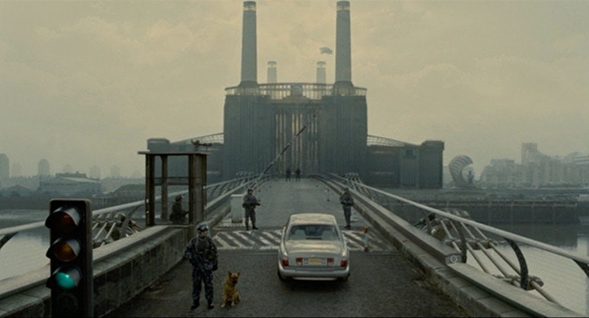 Screenshot from “Children of Men” showing “The Ark of the Arts” at Battersea Power Station, complete with Pink Floyd’s flying pig. (dir. Alfonso Cuarón, 2006). Graphic: Universal Studios