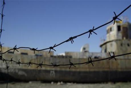 A ship lies derelict in the former Aral Sea port of Aralsk June 18, 2008. Credit: Reuters / Aziz Mamirov