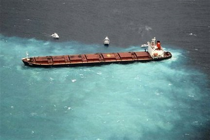 The Chinese carrier Shen Neng 1 was hard aground Sunday on the Great Barrier Reef near Great Keppel Island tourist resort in Australia. The 755-foot bulk carrier was carrying about 72,000 U.S. tons of coal to China when it ran aground Saturday. Australian Maritime Safety Authority via Associated Press
