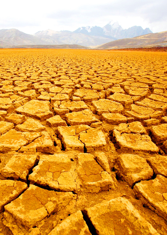 The Milluni reservoir lies dry near La Paz, Bolivia, on Friday. The reservoir is fed by waters from mountain snow that has diminished in an apparent sign of climate change. PHOTO: EPA