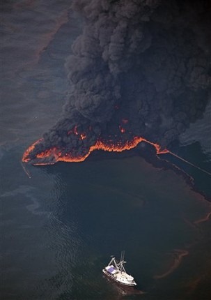 Oil is burned on the surface of the Gulf of Mexico a few miles from the site of the Deepwater Horizon disaster Wednesday, June 16, 2010. Oil is still leaking from the wellhead. AP Photo / Dave Martin